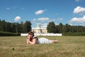 Young woman lying on grass