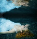 Young woman lying underwater. Royalty Free Stock Photo