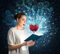 Young woman with magic book Royalty Free Stock Photo