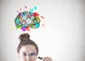 Young woman with magnifying glass, cog brain Royalty Free Stock Photo