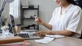 Young woman makes a purchase on the Internet on the laptop with credit card Royalty Free Stock Photo