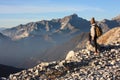 A young woman makes trekking on a mountain