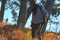 A young woman makes trekking on a mountain