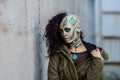 Young woman with makeup of green skull for halloween Royalty Free Stock Photo