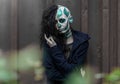 Young woman with makeup of green skull for halloween Royalty Free Stock Photo