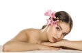 Young woman with makeup  posing with orchids Royalty Free Stock Photo