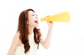 Young Woman making announcement with megaphone Royalty Free Stock Photo