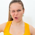 Young woman making a funny grimace Royalty Free Stock Photo