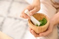 Young woman making healthy facial mask with aloe vera extract at home, closeup Royalty Free Stock Photo