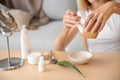 Young woman making healthy facial mask with aloe vera extract at home Royalty Free Stock Photo