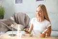 Young woman making healthy facial mask with aloe vera extract at home Royalty Free Stock Photo