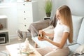 Young woman making healthy facial mask with aloe vera extract at home Royalty Free Stock Photo