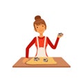 Young woman making pastry, housewife girl cooking food in the kitchen flat vector Illustration