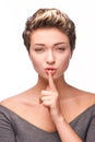 Young woman making silent sign Royalty Free Stock Photo