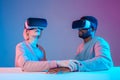 Young woman and man are afraid of dangerous VR environmnet Royalty Free Stock Photo