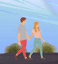 Young woman and man in love, holding each other s hand, walking outdoor. Date of a loving couple Royalty Free Stock Photo