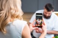 Young woman and man prepare food and host a cooking show. The bloggers stream from modern kitchen. Healthy food Royalty Free Stock Photo