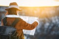 Young woman with a map in the Grand Canyon Royalty Free Stock Photo