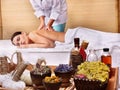 Young woman on massage table in beauty spa. Royalty Free Stock Photo