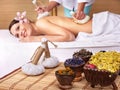 Young woman on massage table in beauty spa. Royalty Free Stock Photo