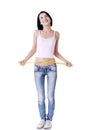 Young woman measuring her waist Royalty Free Stock Photo