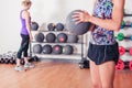 Young woman with medicine ball Royalty Free Stock Photo