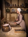 Woman in antique kitchen