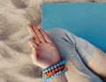 Young woman meditating on beach. Royalty Free Stock Photo