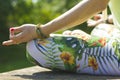 Woman in yoga lotus position