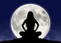 Young woman in meditation at the full moon Royalty Free Stock Photo