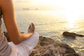 Young woman meditation in yoga pose on the tropical beach Royalty Free Stock Photo