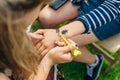 young woman mehendi artist painting henna on the hand Royalty Free Stock Photo