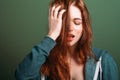 Young woman messy hair tired look headache Royalty Free Stock Photo