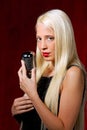 Young woman with a microphone as a singer Royalty Free Stock Photo