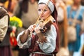 Young woman of the Middle Ages plays a the violin