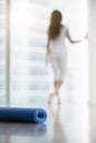 Young woman in a modern studio near the window Royalty Free Stock Photo