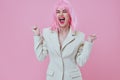 Young woman modern style pink hair Red lips fashion color background unaltered
