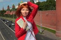Young woman by Moscow Kremlin Royalty Free Stock Photo