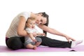 Young woman mother doing fitness exercises with baby, studio portrait isolated on white background Royalty Free Stock Photo