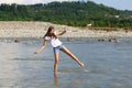 Young woman in mountain river Royalty Free Stock Photo