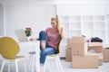 Young woman moving in a new home Royalty Free Stock Photo