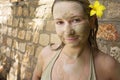 Young woman after mud bath Royalty Free Stock Photo