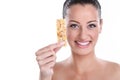 Young woman with muesli bar