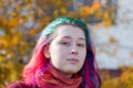 Young woman with multicoloured streaks hair