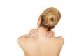 Young woman with nape pain. Royalty Free Stock Photo