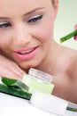 Young woman with natural aloe vera cream Royalty Free Stock Photo