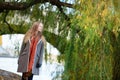 Young woman near a willow tree Royalty Free Stock Photo