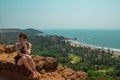 Young woman in North Goa, India. Top view of Vagator Beach Royalty Free Stock Photo
