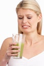 Young Woman Not Enjoying Healthy Drink