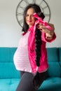 Young woman offering braid hair in solidarity for patients with chemotherapy Royalty Free Stock Photo